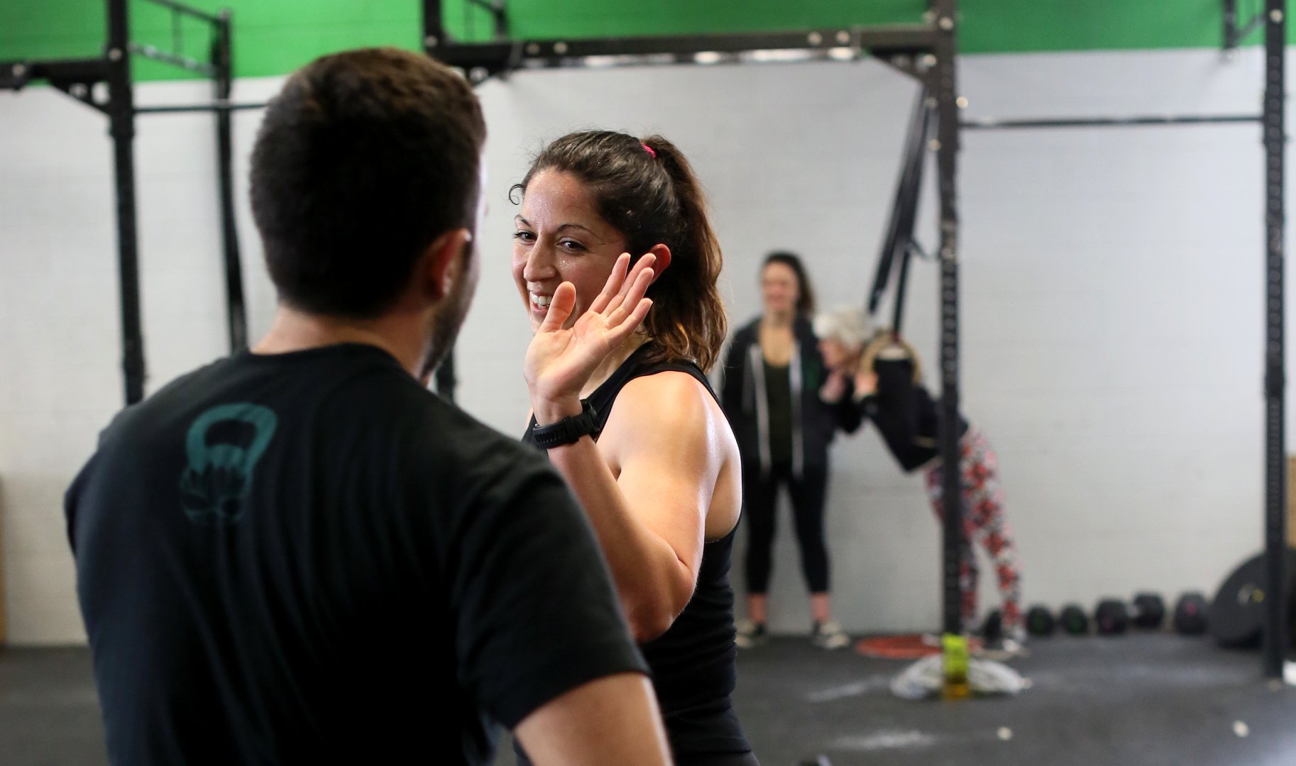 https://www.crossfitinvictus.com/wp-content/uploads/2014/09/Nadia-High-Five.jpg