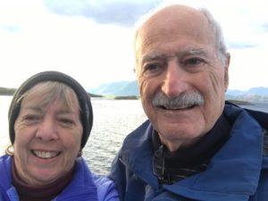 Invictus's oldest members - Liz & Larry - pose outside a glacier lake in Iceland.