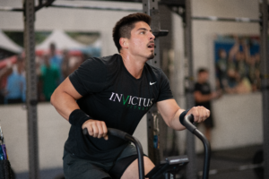 Male Invictus Athlete pushing his VO2 max on the Assault Bike.