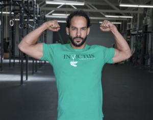 Masters athlete Nuno Costa posing in the San Diego Invictus gym.